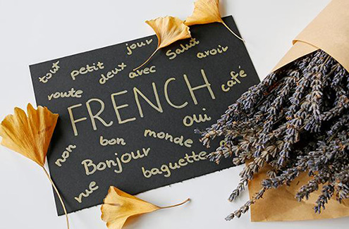 chalkboard with french words written on it